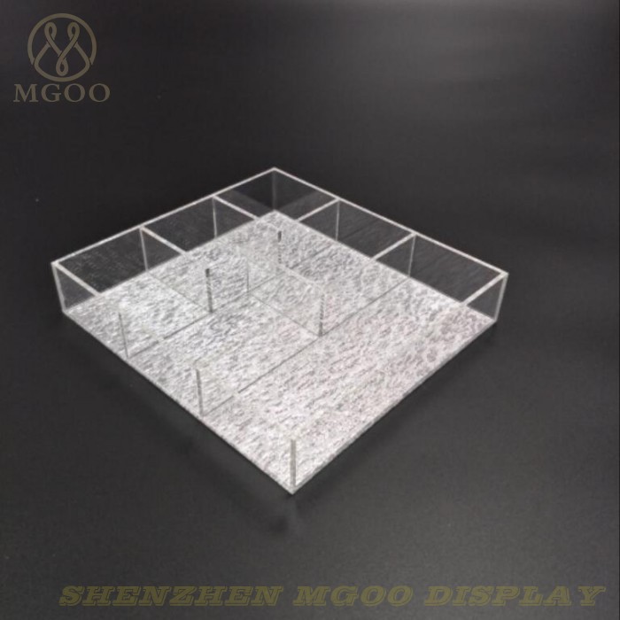 clear acrylic tray with various compartment